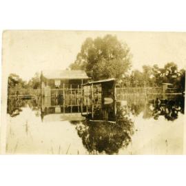 Flooding around an early settler house