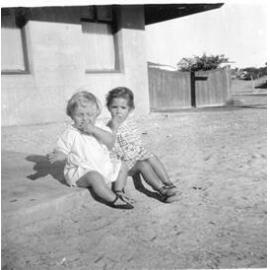 Children watching the traffic go by at Paringa Flats in Scarborough 1947