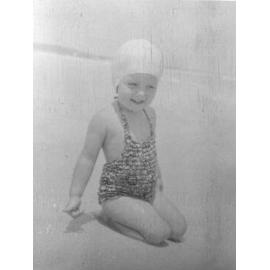 Child playing at Scarborough beach 1948