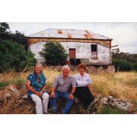 Phylis Robinson, Colin Moore and Rae Kolb in front of Bestry Cottage prior to restoration