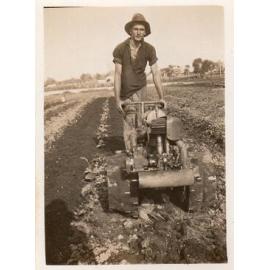 Beresford (Beb) Arbuckle in a field at the family market garden
