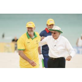 Dennis Lillee and umpire at the beach cricket competition at Scarborough Beach in 2007