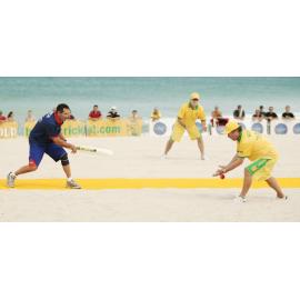 English player batting at the beach cricket competition at Scarborough Beach in 2007