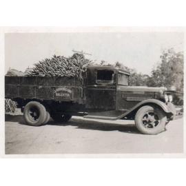Arbuckle truck loaded with carrots 