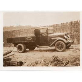 Arbuckle truck with J Arbuckle and Sons signage on tray