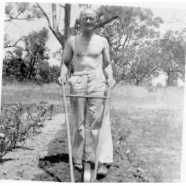 Allan Maddox's father turning soil in garden of Balga property