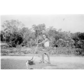 Allan Maddox's father cutting lawn at Balga home