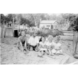 Allan Maddox playing with sister and friends at their Balga property