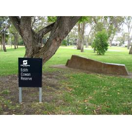Edith Cowan Reserve Learning Support plinth with Edith Cowan Reserve sign