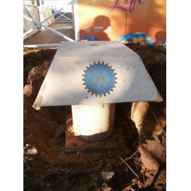 Scarborough time capsule showing Rotary logo plaque during removal for 2016 development