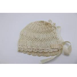 Baby bonnet with embossed ribbon ties