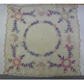 Hand embroidered handkerchief with mauve floral motifs