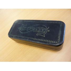 Singer sewing accessories and tools in tin